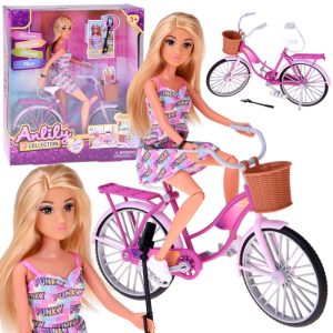 Poupee sur velo anliby + accessoires