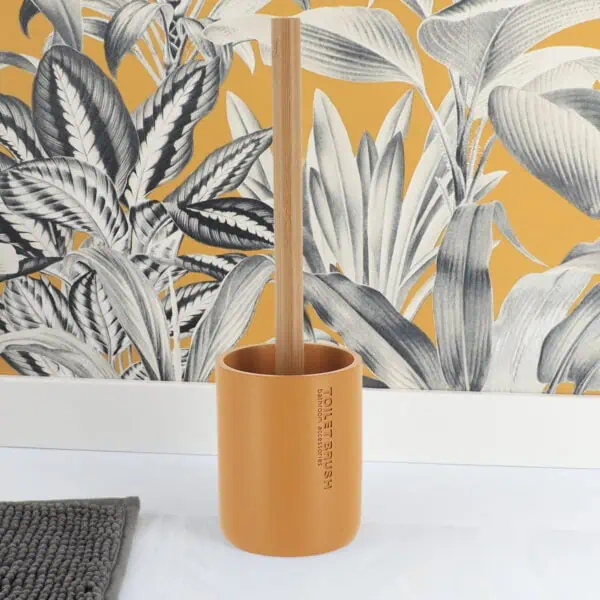2-66101199-Toilet-brush-in-bathroom-setting-with-matching-botanical-wallpaper-600x600